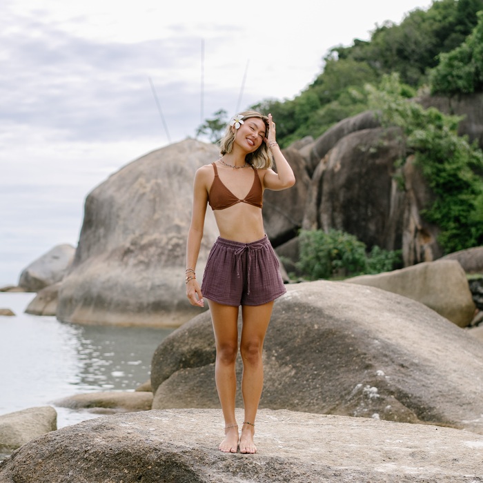 Lunar Sky Cotton Cabana Shorts, worn on the beach