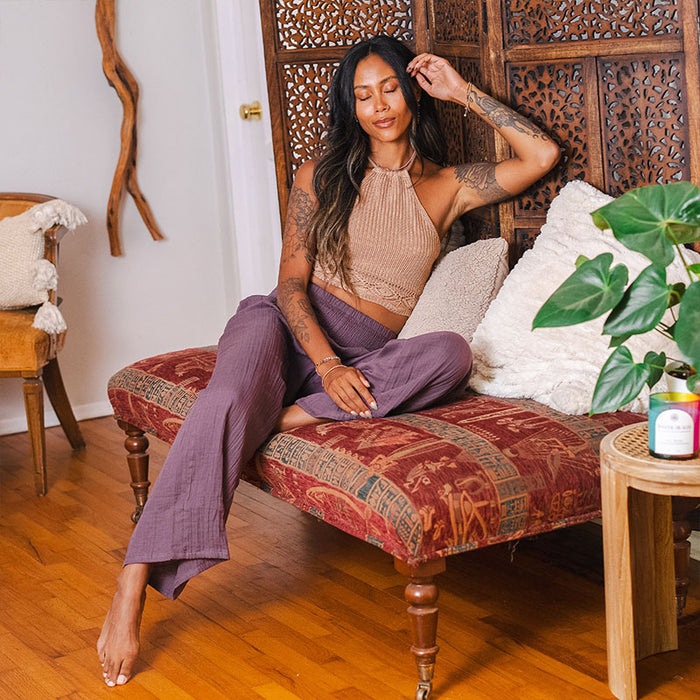 Lunar Sky Wide Leg Pants, seated indoors