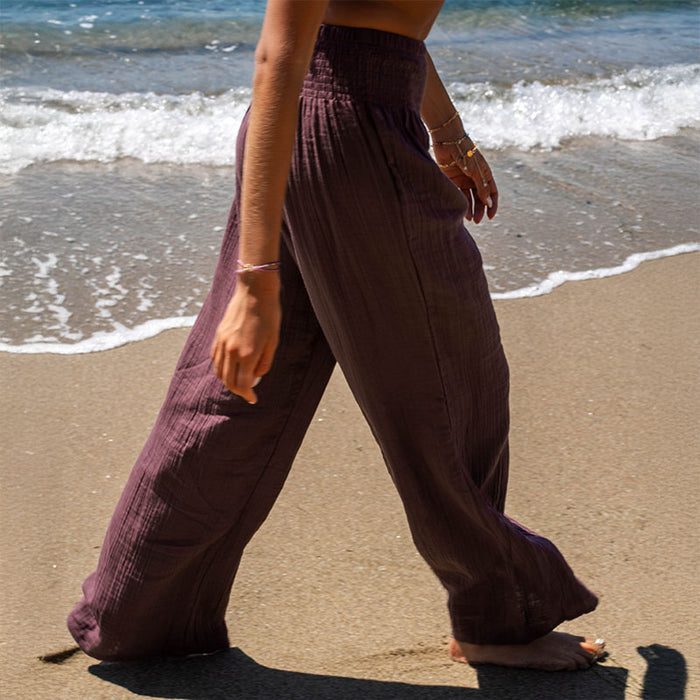 Lunar Sky Wide Leg Pants, worn walking on the beach