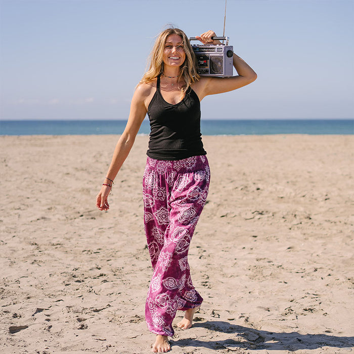 Magenta Chakra Harem Pants, worn walking on the beach