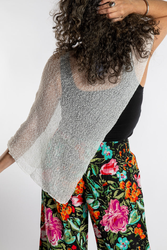 Susan is wear the Magic Lightweight Capelet in White