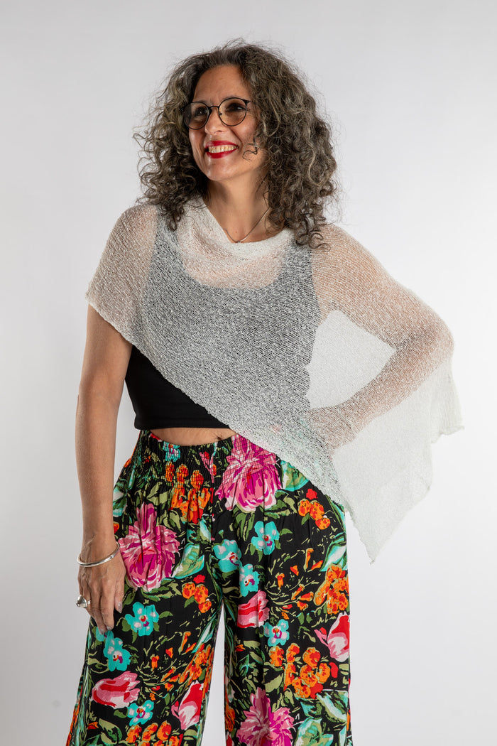 Susan is wear the Magic Lightweight Capelet in White