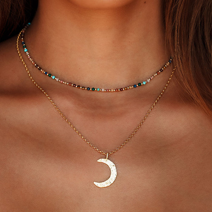 Master Healer 2mm Healing Necklace, layered with gold moon pendant