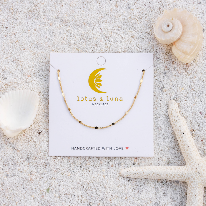 Master Healer 3mm + 2mm Necklace Stack, flat lay on card on sand