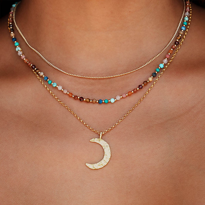 Master Healer 3mm Healing Necklace, layered on neck with moon pendant