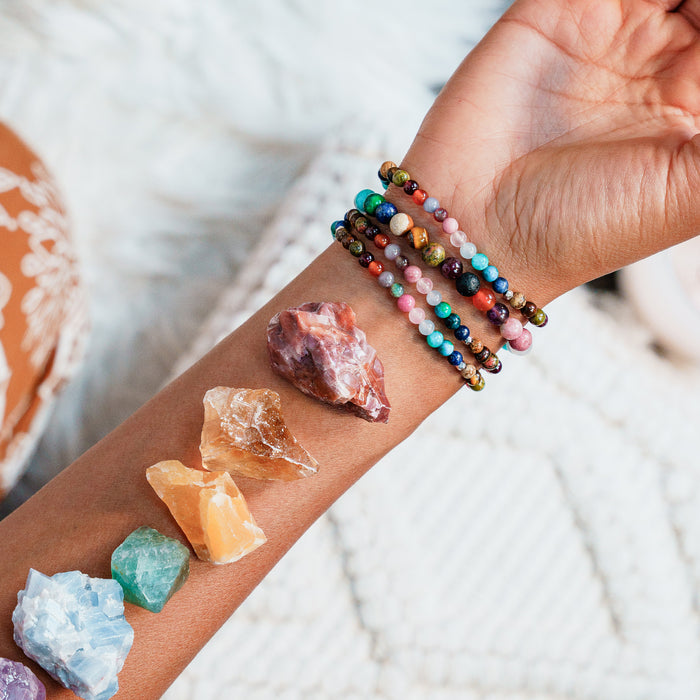 Master Healer 4mm Healing Bracelet, on forearm with crystals