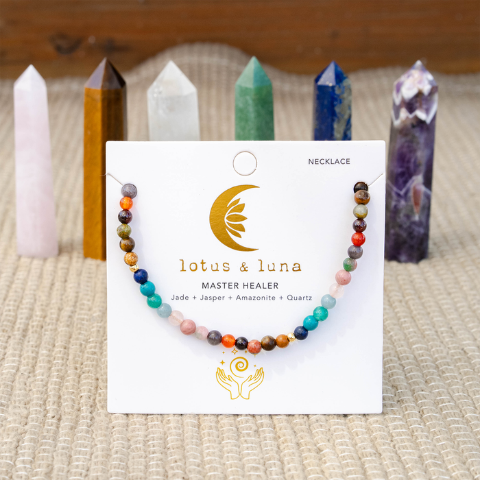 Master Healer 4mm Healing Necklace, flat lay on brand card