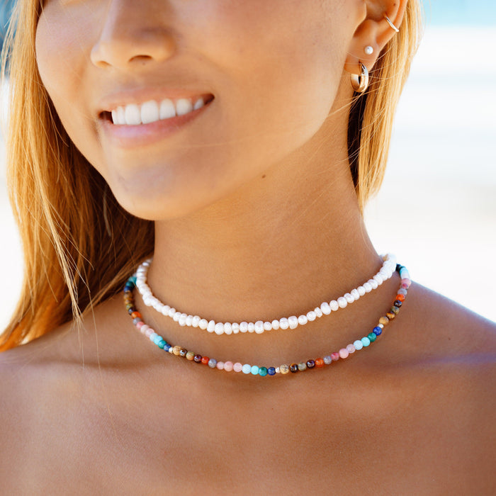 Master Healer + Self Love Necklace Stack, worn outdoors