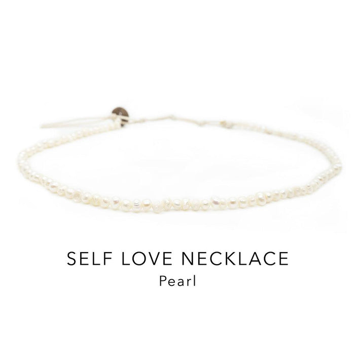 Pearl healing necklace with a coconut button clasp