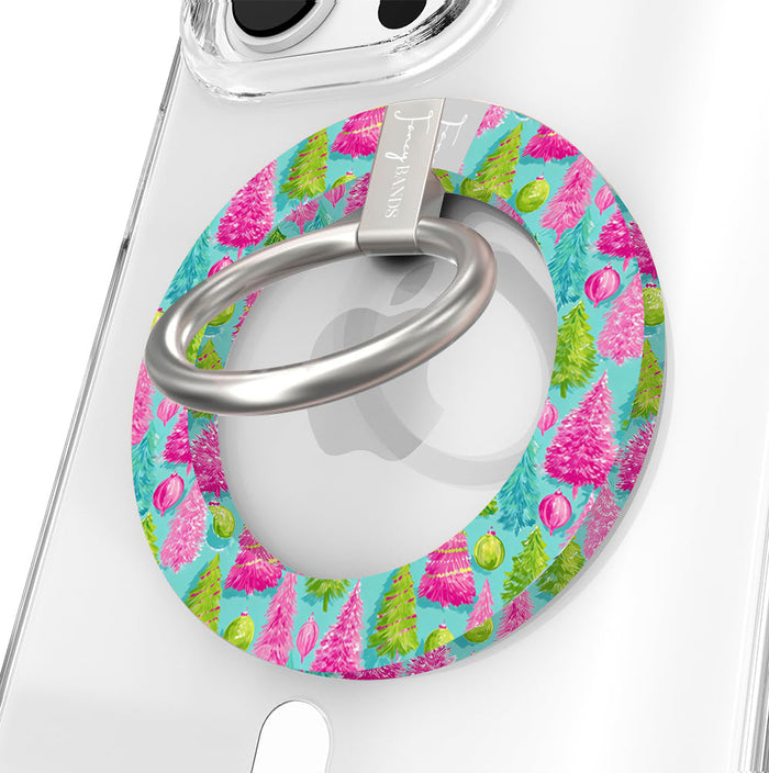Close-up of the Merry & Bright, Totally! MagSafe grip ring with pink and lime Christmas trees on aqua and a brushed silver ring on a clear iPhone case
