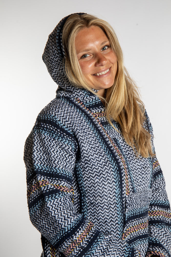 Sophie is wearing a small artesia recycled baja hoodie