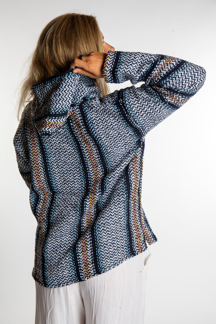 Sophie is wearing a small artesia recycled baja hoodie