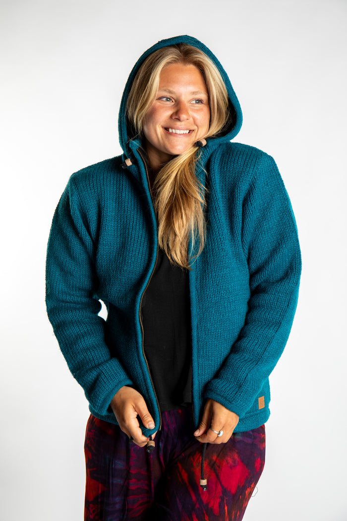 Sophie wearing size S Teal Wool hoodie jacket
