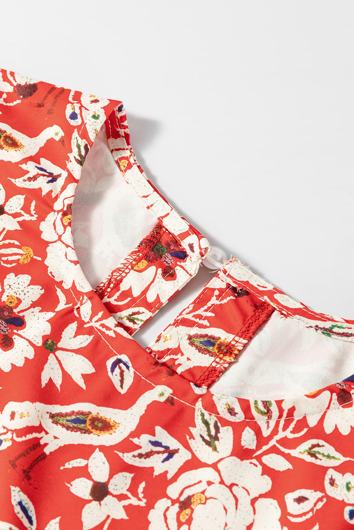 Mini-robe plissée à manches longues et patchwork floral *