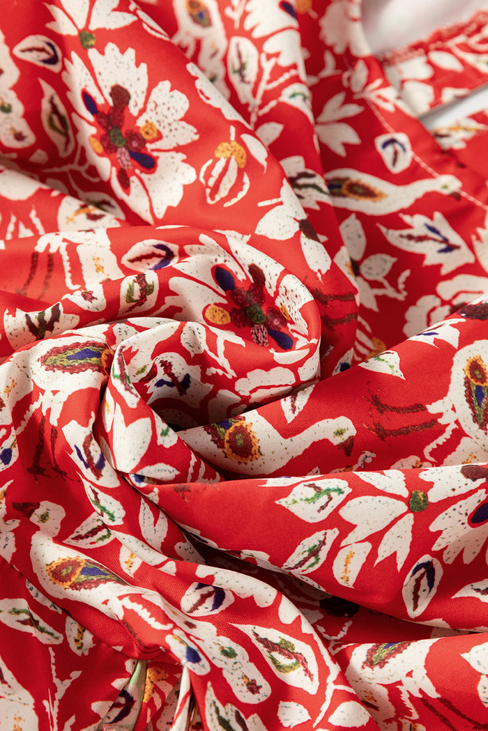 Mini-robe plissée à manches longues et patchwork floral *