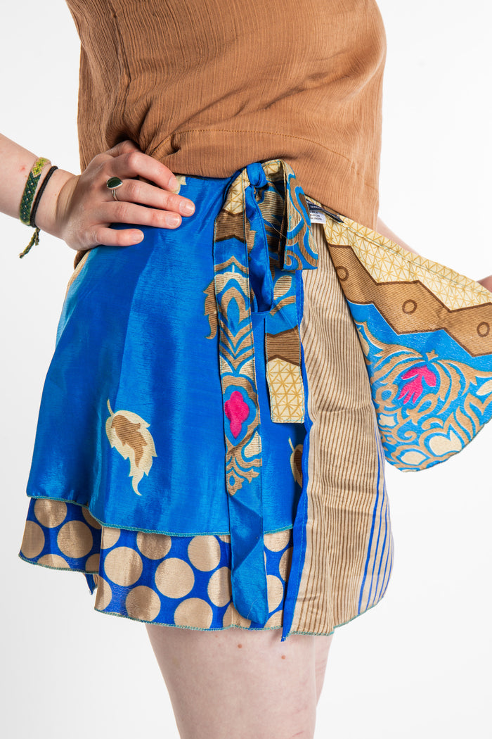 Honora is wearing a silk wrap skirt in Morning Dew