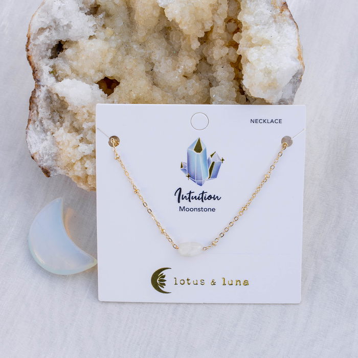Moonstone Necklace, flat lay on card gold chain
