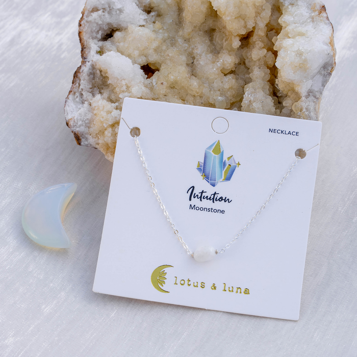 Moonstone Necklace, flat lay on card silver chain