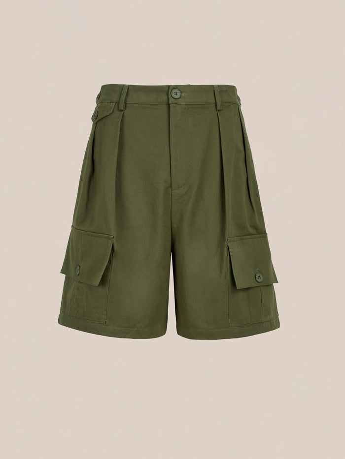 Found Multi Pocket Shorts in olive green feature front pleats, belt loops, button and zip closure, and large buttoned side pockets for classic utility style, shown on a neutral background.