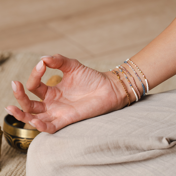 Mystery Bracelet, stacked on wrist in meditation