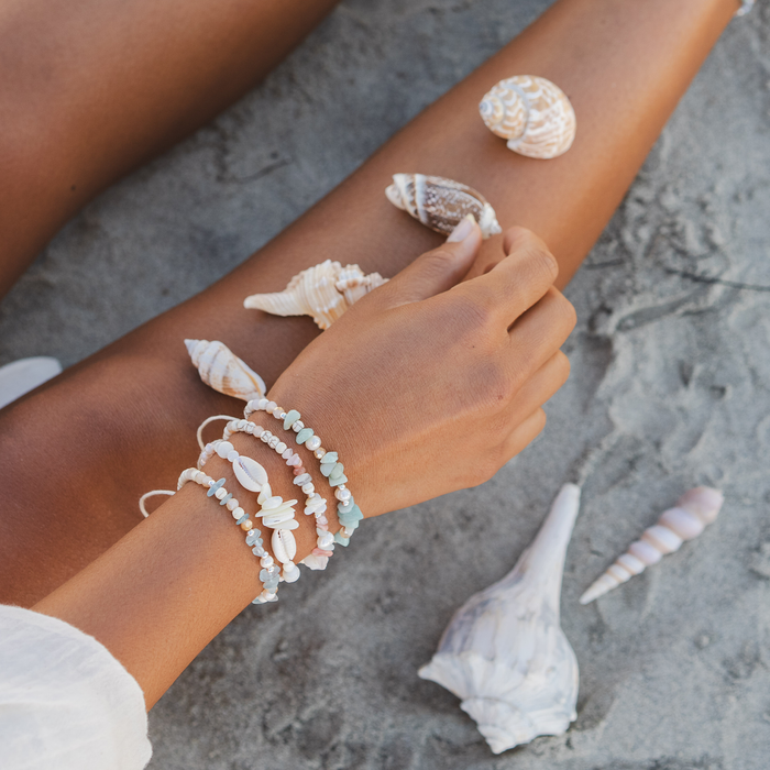Mystery Bracelet, beaded stack on the sand