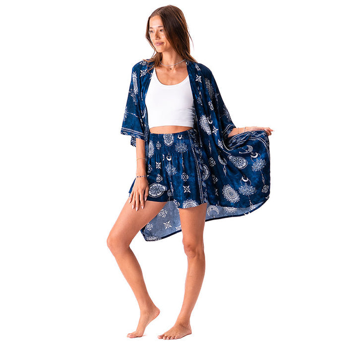 Nightfall Blue Lotus Moon Kimono, front holding hem