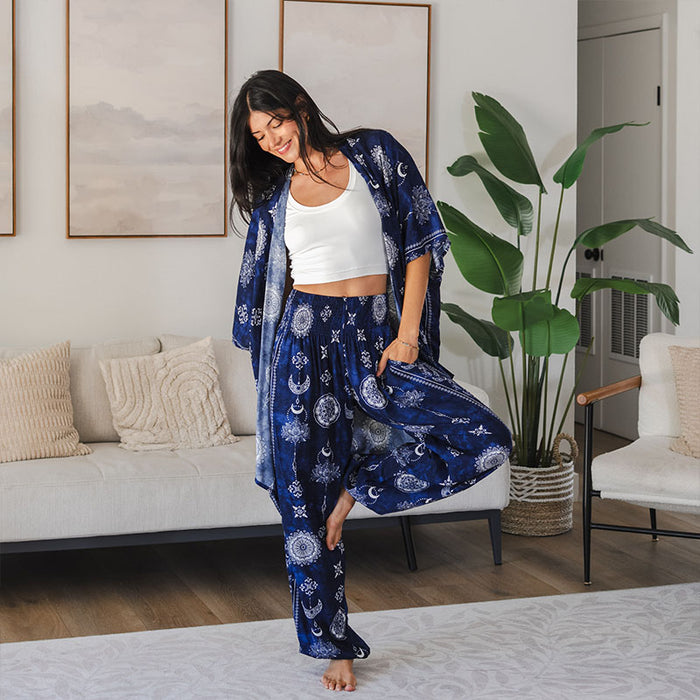 Nightfall Blue Lotus Moon Lounge Set, worn lifting the pant leg