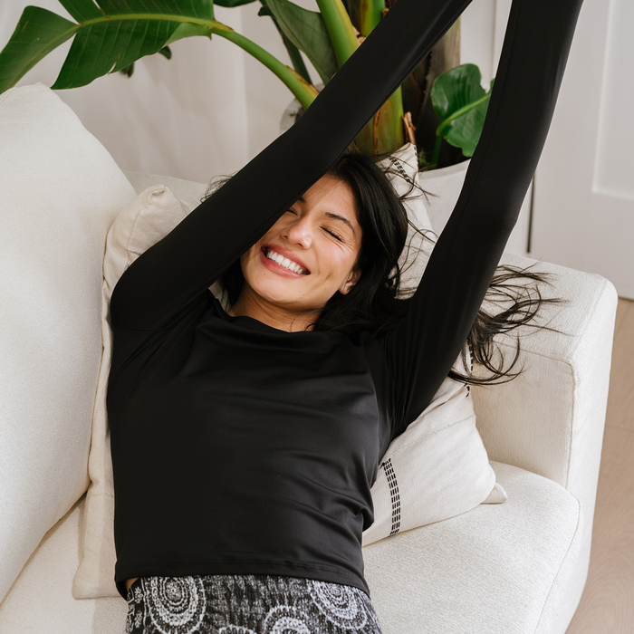 Onyx Hatha Long Sleeve Top, worn reclining