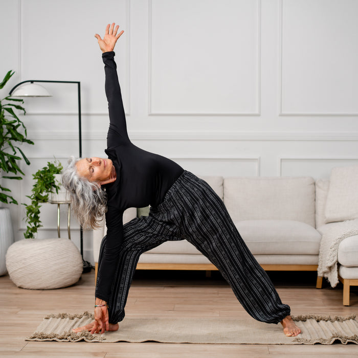 Onyx Hatha Long Sleeve Top, worn in a yoga pose