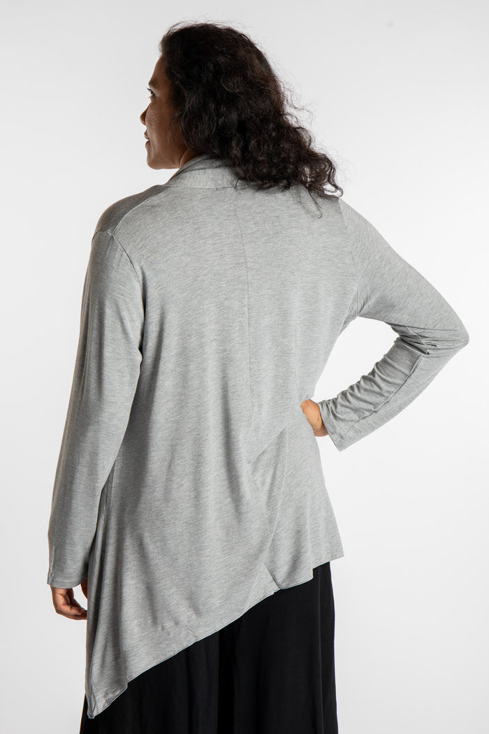 Teciane is wearing the Solid Color Cover-Up is Light Gray