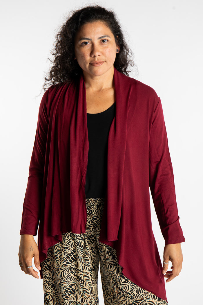 Teciane is wearing the Solid Color Cover-Up is Maroon