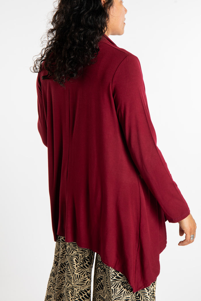 Teciane is wearing the Solid Color Cover-Up is Maroon