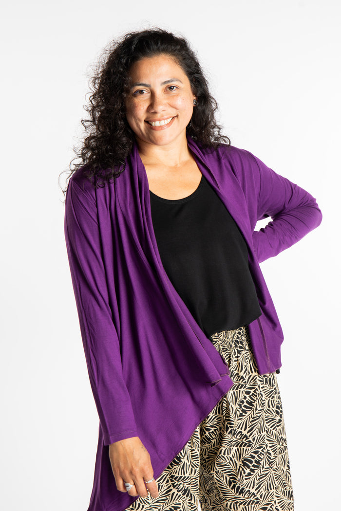Teciane is wearing the Solid Color Cover-Up is Purple