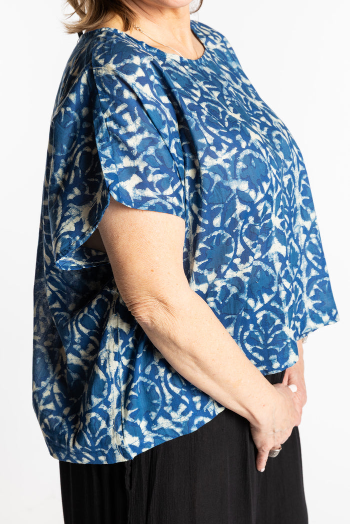 Betty is wearing the L/XL Blue floral Screen Printed Cotton Blouse