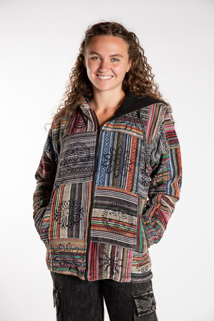 Emily is wearing the Black Pahadi Patchwork Jacket in S/M