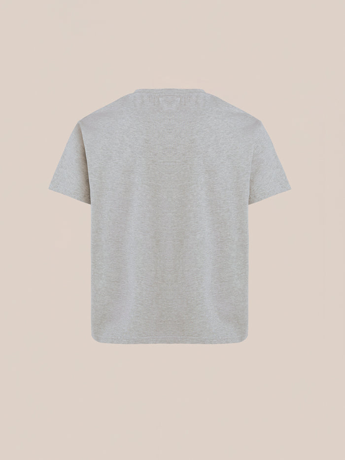 The FOUND Painters Company Tee, vintage-inspired in gray, is presented on a neutral background, featuring short sleeves and a round neckline from the back.