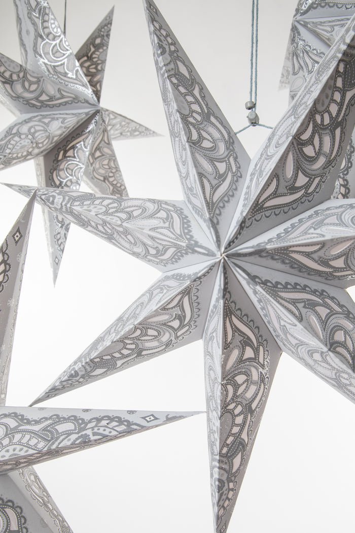 boho star decoration pack in silver on white background