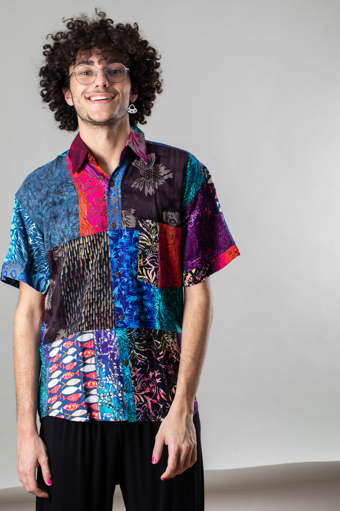 Marc is wearing size L patchwork button up shirt in multicolor