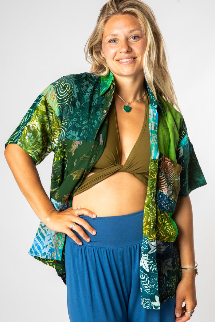 Sophie is wearing size M patchwork button up shirt in green