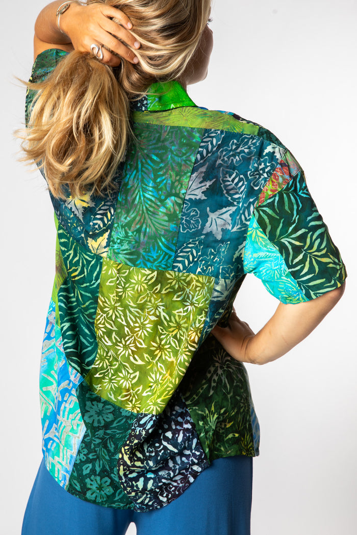 Sophie is wearing size M patchwork button up shirt in green
