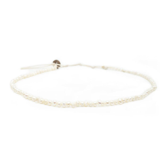 Peace Protector 2mm Healing + 4mm Self Love Necklace Stack, flat lay pearls