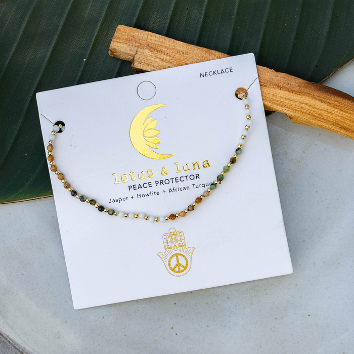 Peace Protector 2mm Healing Necklace, worn on the beach
