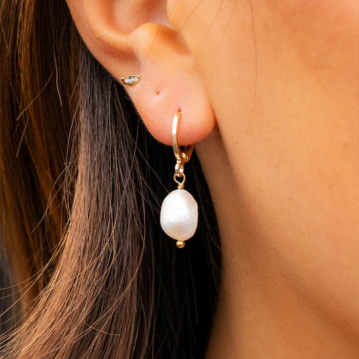 Pearl Drop Earrings, worn on ear