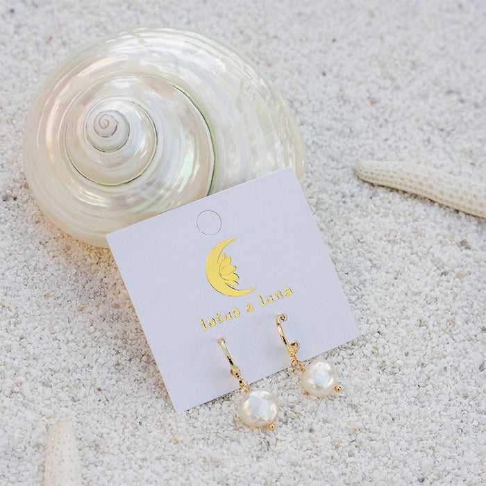 Pearl Drop Earrings, on card at the beach