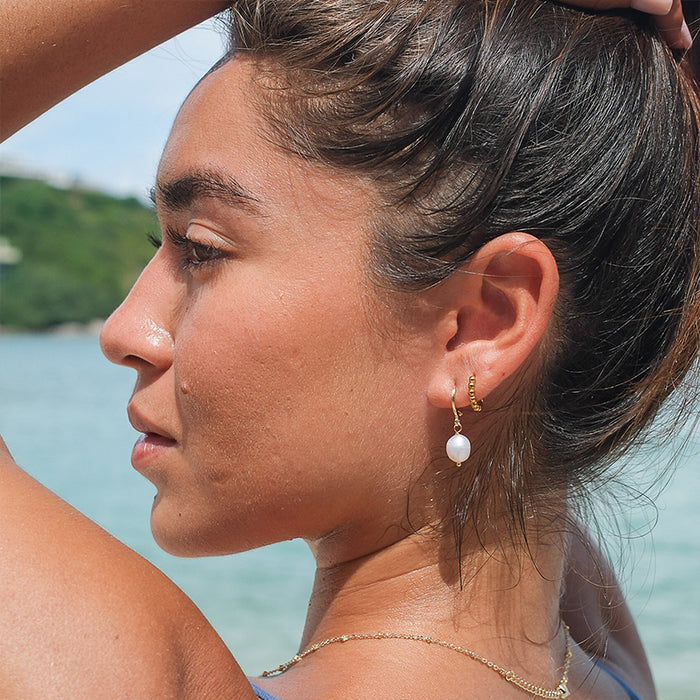 Pearl Drop Earrings, worn in profile