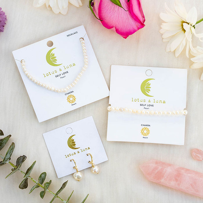 Pearl Drop Earrings, flat lay with matching set