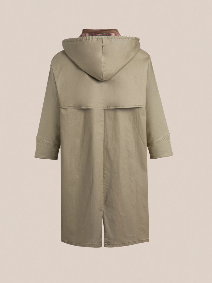 The back view of a Found Prairie Buckle Coat in khaki, featuring fireman clasps.