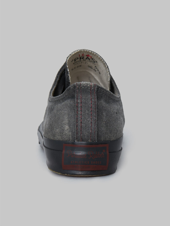 pras low shellcap sumi hand dyed black sneakers back look logo