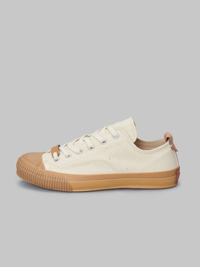 pras sellcap low leather pull strap kinari gum sneakers
