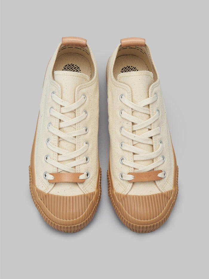 pras sellcap low leather pull strap kinari gum sneakers laces